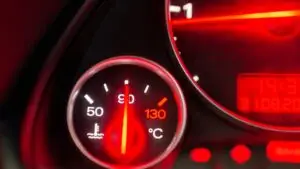 Car temperature gauge showing an engine overheating warning